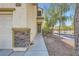 Inviting front entryway showcasing brick accents, desert landscaping, and a well-maintained walkway to the front door at 2905 Vigilante Ct, North Las Vegas, NV 89081
