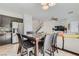 Open concept, featuring eat in kitchen, access to the second floor, and direct access to the living area at 2905 Vigilante Ct, North Las Vegas, NV 89081