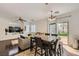 Open-concept area featuring living area, eat in kitchen, and access to the backyard, ideal for entertaining at 2905 Vigilante Ct, North Las Vegas, NV 89081