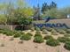 Beautiful Inspirada community sign surrounded by lush greenery and desert landscaping at 3197 Vittoria Ave, Henderson, NV 89044