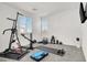 Home gym equipped with various exercise machines and fitness accessories for a healthy lifestyle at 3197 Vittoria Ave, Henderson, NV 89044