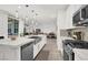 Modern kitchen with stainless steel appliances and a large island, perfect for entertaining at 3197 Vittoria Ave, Henderson, NV 89044