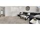 Cozy living room with a large sectional sofa, stylish coffee table, and natural light at 3197 Vittoria Ave, Henderson, NV 89044