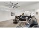 Spacious living room with ceiling fan and ample seating, ideal for relaxation and gatherings at 3197 Vittoria Ave, Henderson, NV 89044