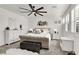 Elegant main bedroom featuring a comfortable bed, stylish decor, and bright windows at 3197 Vittoria Ave, Henderson, NV 89044
