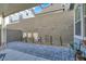 Covered patio with decorative garden, featuring a paved area and neutral color scheme at 3197 Vittoria Ave, Henderson, NV 89044