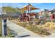 Community playground with shade cover, slide and play equipment at 3197 Vittoria Ave, Henderson, NV 89044