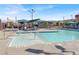 Community pool with lounge chairs and umbrellas, perfect for relaxation at 3197 Vittoria Ave, Henderson, NV 89044
