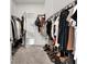 Spacious walk-in closet with ample storage, hanging racks, and organized shelving at 3197 Vittoria Ave, Henderson, NV 89044
