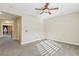Spacious bedroom featuring carpet floors and neutral colored walls at 395 Suzanne Peak Ct, Henderson, NV 89012