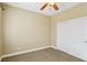 Comfortable bedroom with neutral walls, closet, and carpeted floors for a cozy living space at 395 Suzanne Peak Ct, Henderson, NV 89012