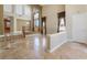 Bright living room with high ceilings, large windows, tile floors and recessed lighting at 395 Suzanne Peak Ct, Henderson, NV 89012