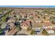 Expansive aerial view of a meticulously planned neighborhood with uniformly designed homes and well-maintained landscaping at 395 Suzanne Peak Ct, Henderson, NV 89012