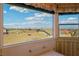 This bathroom features a large window that offers beautiful views of the surrounding area at 395 Suzanne Peak Ct, Henderson, NV 89012