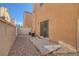 Low maintenance backyard with a gravel and small concrete tile section at 11135 Abbeyfield Rose Dr, Henderson, NV 89052