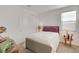 Cozy bedroom with double bed and window coverings at 2261 Cold Canyon Ave, North Las Vegas, NV 89086