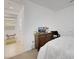 Bedroom with double bed, dresser, and access to hallway at 2261 Cold Canyon Ave, North Las Vegas, NV 89086