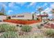 Gated community entrance with signage and landscaping at 2261 Cold Canyon Ave, North Las Vegas, NV 89086