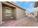 Front entrance with brick walkway and exterior lighting at 2261 Cold Canyon Ave, North Las Vegas, NV 89086