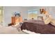 Main bedroom with large windows and dresser, offering lots of light at 2261 Cold Canyon Ave, North Las Vegas, NV 89086