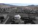 Expansive aerial view showcases a neighborhood, highlighting one particular property at 3372 Dalmore St, Henderson, NV 89044