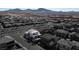 Wide aerial view of a Primary planned community, highlighting one particular property at 3372 Dalmore St, Henderson, NV 89044