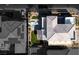 Bird's eye view of a backyard with hot tub, patio and landscaping, highlighting the subject property at 3372 Dalmore St, Henderson, NV 89044