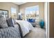 Serene bedroom with large windows, providing natural light and scenic views of the surroundings at 3372 Dalmore St, Henderson, NV 89044