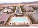 Aerial shot showcasing the community pool area, featuring clean design and ample lounge seating at 3372 Dalmore St, Henderson, NV 89044