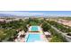 Aerial view of the community pool area, showcasing well-maintained pools, lounge areas, and landscaping at 3372 Dalmore St, Henderson, NV 89044