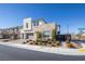 Modern two-story home with a stone facade, two-car garage, and manicured front yard at 3372 Dalmore St, Henderson, NV 89044