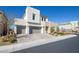 Modern two-story home with a two-car garage and low maintenance landscaping at 3372 Dalmore St, Henderson, NV 89044
