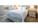 Comfortable main bedroom with a decorative headboard and bedside table at 3372 Dalmore St, Henderson, NV 89044