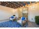 Cozy patio with comfortable seating under a pergola, perfect for relaxation or entertaining guests at 3372 Dalmore St, Henderson, NV 89044