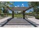 Arbor shading with stone benches, providing a shaded area for park visitors at 3372 Dalmore St, Henderson, NV 89044
