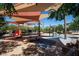 Playground featuring colorful play equipment and sun shades, offering a fun and safe environment for  at 3372 Dalmore St, Henderson, NV 89044