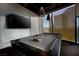 Game room with a pool table and city views at 3726 Las Vegas Blvd # 1101, Las Vegas, NV 89158