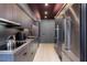Modern kitchenette featuring stainless appliances and gray cabinetry at 3726 Las Vegas Blvd # 1101, Las Vegas, NV 89158