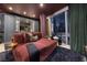 Cozy room features comfortable seating, built-in storage, and large windows offering a stunning city view at 3726 Las Vegas Blvd # 1101, Las Vegas, NV 89158