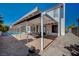 Inviting backyard oasis with a covered patio, pool and grill at 4773 Sarazen Cir, Las Vegas, NV 89103