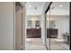 Bathroom with double vanity and mirrored closet at 4773 Sarazen Cir, Las Vegas, NV 89103