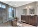 Elegant bathroom with double vanity and large shower at 4773 Sarazen Cir, Las Vegas, NV 89103