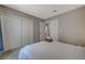 Cozy bedroom with double doors and ample closet space at 4773 Sarazen Cir, Las Vegas, NV 89103