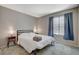 Comfortable bedroom with a queen-size bed and ensuite bathroom at 4773 Sarazen Cir, Las Vegas, NV 89103