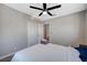 Spacious bedroom with a queen bed, nightstand and closet at 4773 Sarazen Cir, Las Vegas, NV 89103