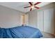 Comfortable bedroom with a queen bed and double doors leading to closet at 4773 Sarazen Cir, Las Vegas, NV 89103