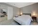 Simple bedroom with a queen-size bed and access to a bathroom at 4773 Sarazen Cir, Las Vegas, NV 89103
