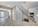 Tiled entryway with staircase and interior view at 4773 Sarazen Cir, Las Vegas, NV 89103