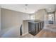 Upstairs hallway with built-in cabinet and bathroom access at 4773 Sarazen Cir, Las Vegas, NV 89103