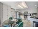 Bright kitchen features stainless steel appliances and an island at 4773 Sarazen Cir, Las Vegas, NV 89103